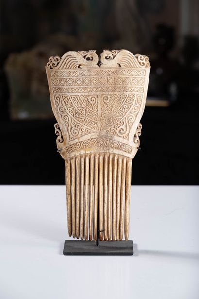 Antique carved bone comb. H.27.9 cm.