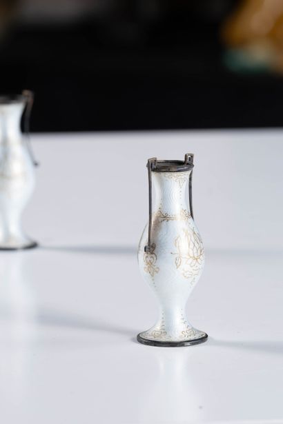Guilloché enamel
Pair of small vases in white...