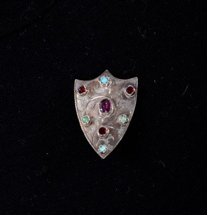 Bijoux
Broche en forme d'écu sertie de grenats,...