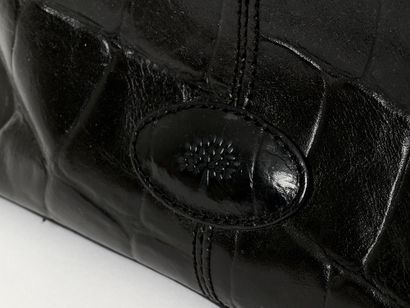 MULBERRY - United Kingdom
Crocodile embossed...