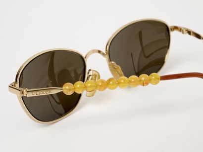 OLIVER
Trois paires de lunettes de solei...