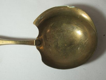 Cuillère à sauce en argent fourré et métal...