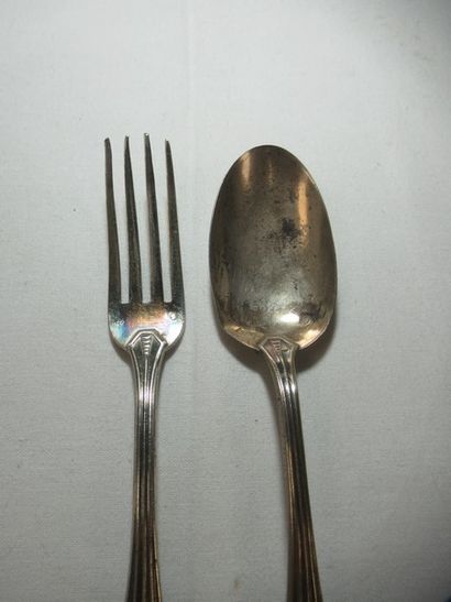 Couvert de baptême en argent . Poids 58g....