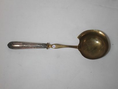 Cuillère à sauce en argent fourré et métal...