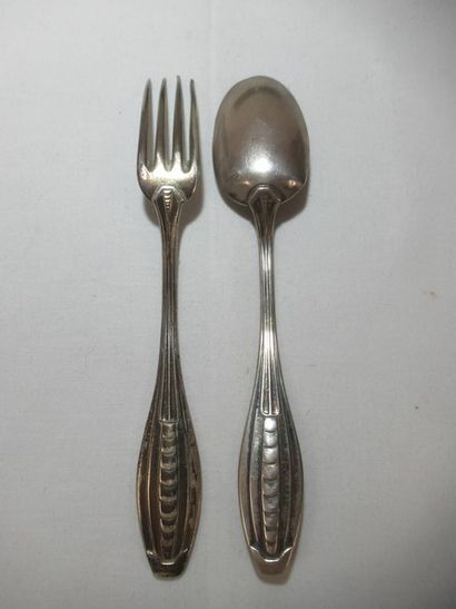 Couvert de baptême en argent . Poids 58g....