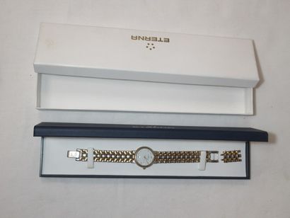ETERNA Montre pour dame en métal. Avec des...