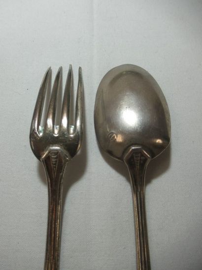 Couvert de baptême en argent . Poids 58g....