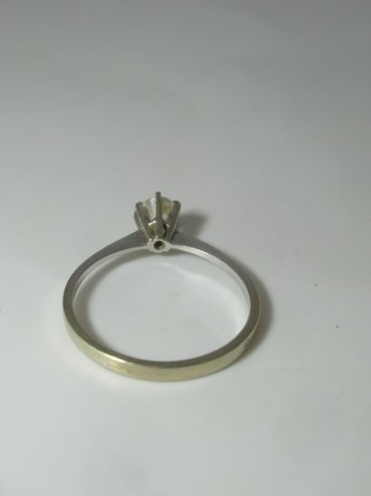 Bague en or jaune rhodié 18k (tête d'aigle),...