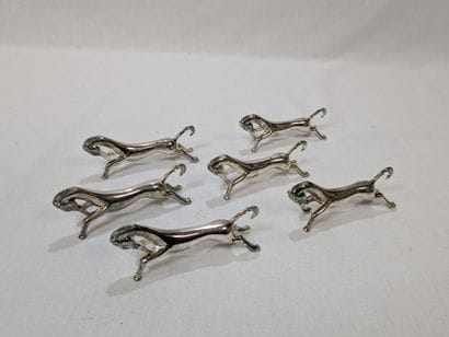 Série de 6 porte-couteaux en métal figurant...