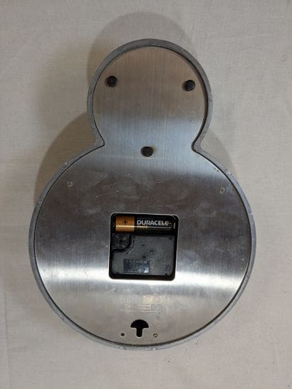 BERGT EK DESIGN. Horloge en métal et résine...