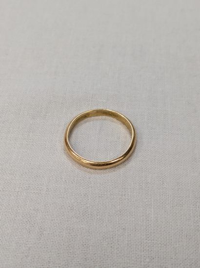 18K yellow gold wedding band. Weight: 2.54...
