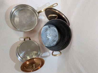 Tin-plated copper set including: a saucepan,...