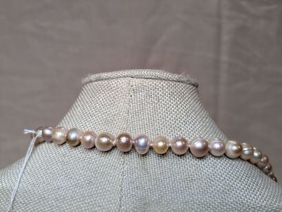 Sautoir en perles de culture. Pompon amovible,...
