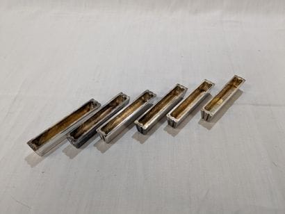 Lot de 6 portes-couteaux en métal argenté...