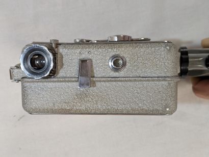 CAMEX. Camera made of metal, resin, and glass,...