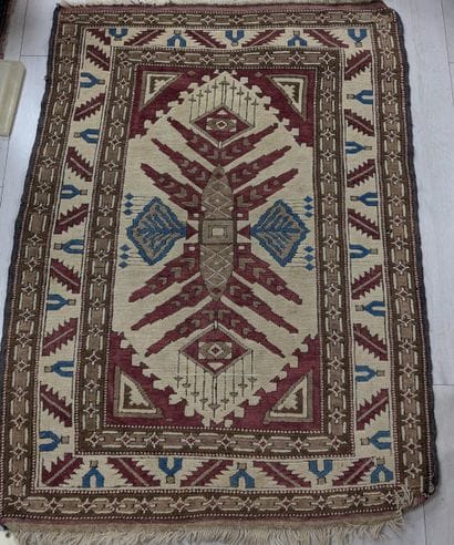 ORIENT, wool rug with a geometric pattern...