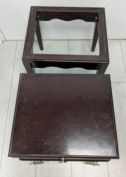 Small, varnished wooden kitchen cabinet consisting...