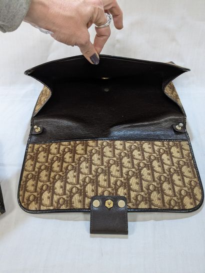 DIOR Lot de deux pochettes en toile monogrammée....