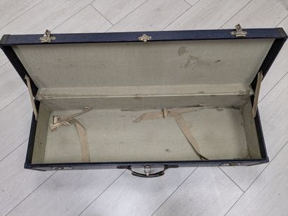 Cardboard trunk covered in oiled fabric....