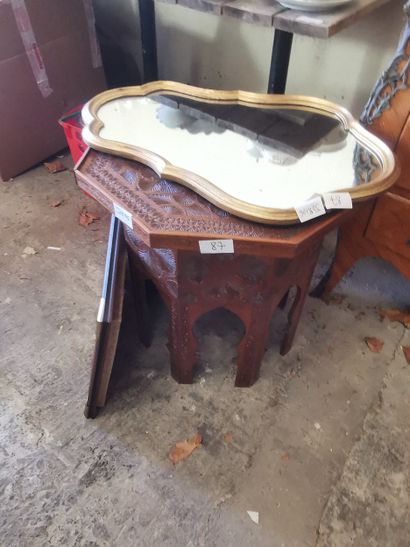 Table basse octogonale en bois sculpté
Miroir...