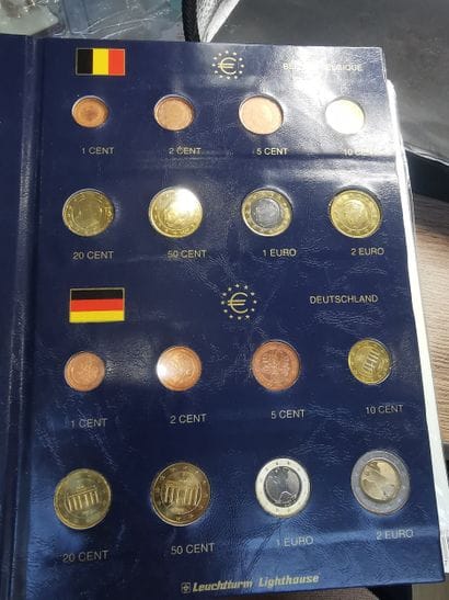 12 sets of euro coins from various countries...