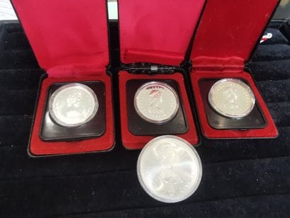 LOT of three 1 Canadian Dollar coins in silver...