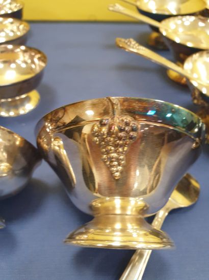 A set of 8 tastevins and 8 dishes with their...