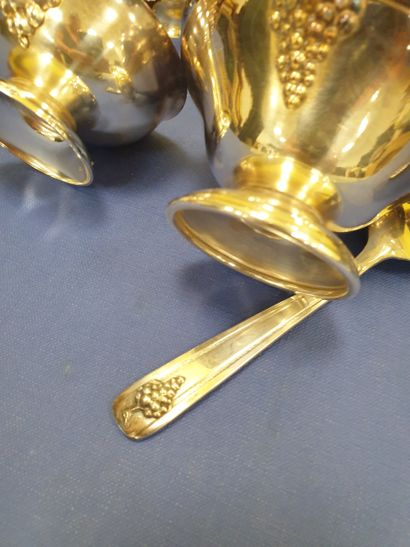 A set of 8 tastevins and 8 dishes with their...