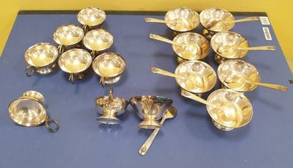 A set of 8 tastevins and 8 dishes with their...