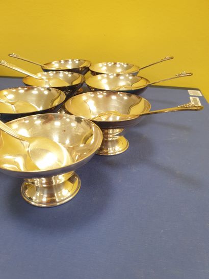 A set of 8 tastevins and 8 dishes with their...