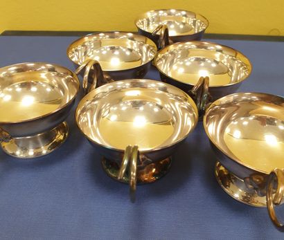 A set of 8 tastevins and 8 dishes with their...