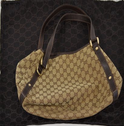 GUCCI
Sac à main beige marron en toile avec...