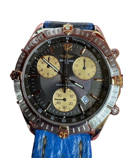 Montre BRETLING, modèle Chronomat or/acier...