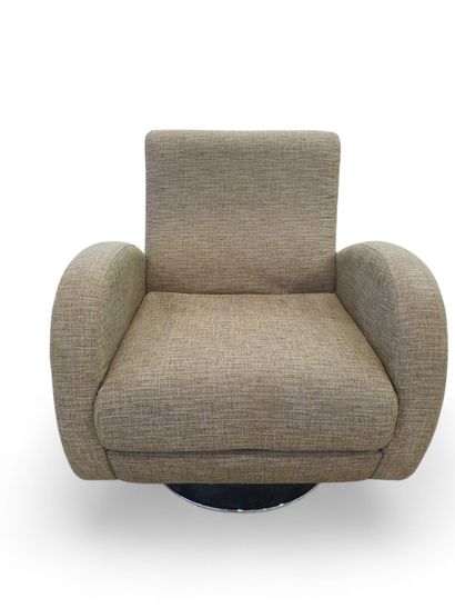 Armchair with swivel armrests upholstered...