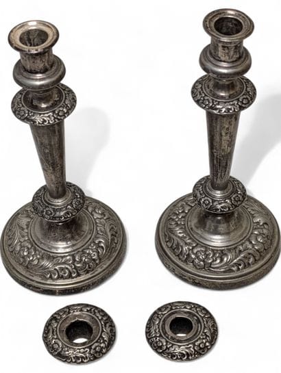 Pair of silver sheet torches, repoussé-worked...