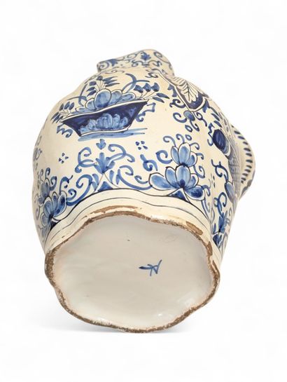 ROUEN
Earthenware pitcher with blue monochrome...