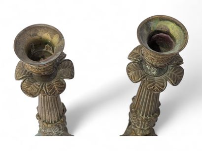 Pair of candlesticks in chased bronze with...
