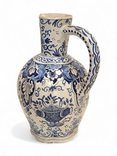 ROUEN
Earthenware pitcher with blue monochrome...