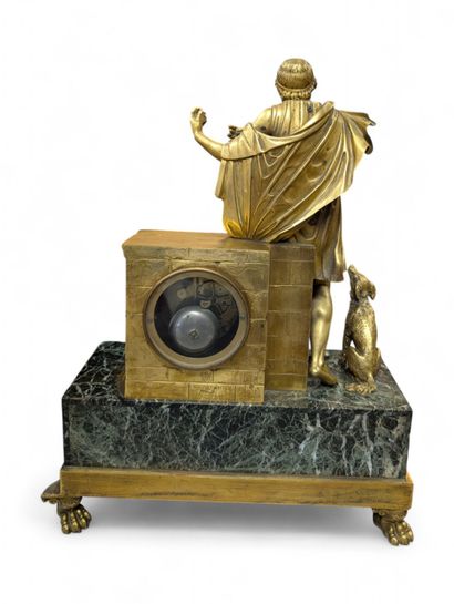 Gilt bronze terminal clock flanked by the...