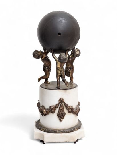 Gilded patina bronze globe clock featuring...