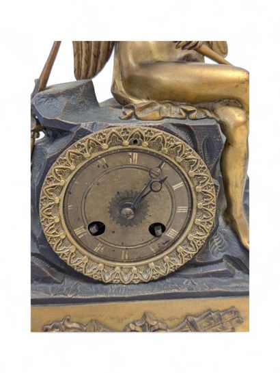 Chased and gilded bronze terminal clock surmounted...