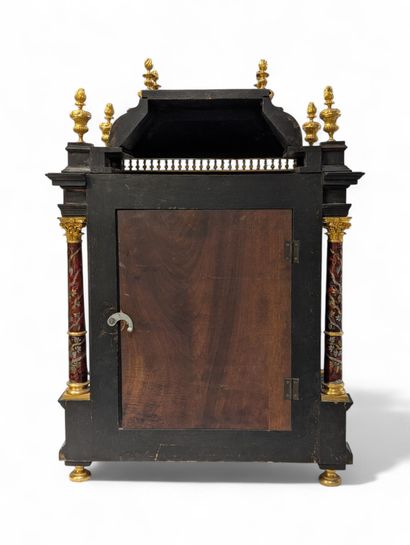 Large Boulle marquetry cartel, flanked by...