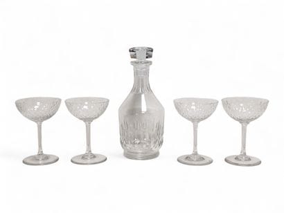 BACCARAT
Suite de 4 coupes à champagne en...
