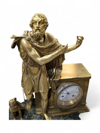 Gilt bronze terminal clock flanked by the...