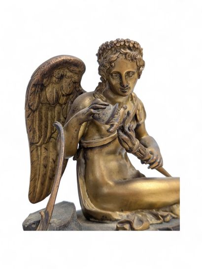Chased and gilded bronze terminal clock surmounted...