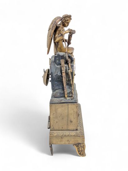 Chased and gilded bronze terminal clock surmounted...