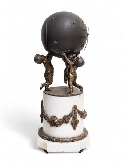 Gilded patina bronze globe clock featuring...