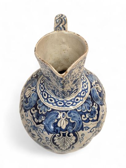ROUEN
Earthenware pitcher with blue monochrome...