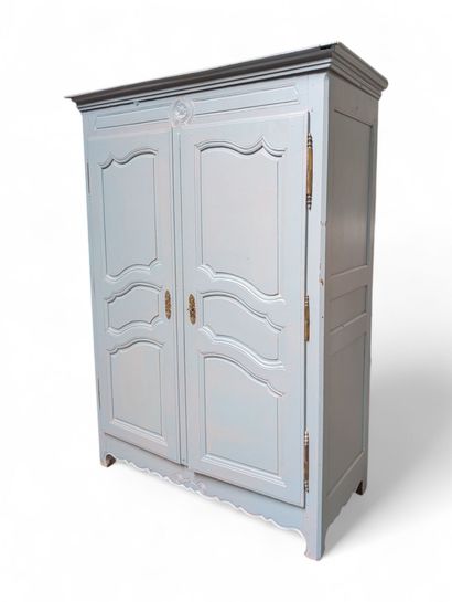 Armoire de chambre en chêne mouluré et sculpté...