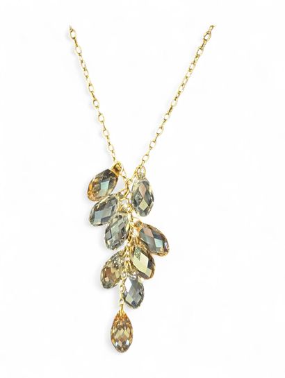 SWAROVSKI
Collier en métal plaqué or à décor...